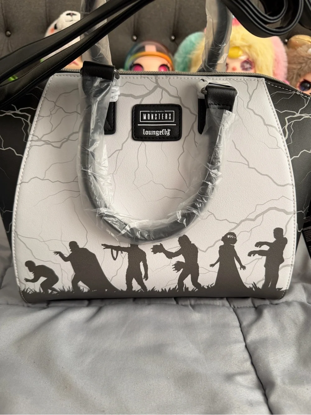 Loungefly Classic Monsters Satchel Bag - White & black. Comes with strap.